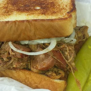 Oklahoma poboy (pulled pork with sausage link) on Texas toast; excellent....5/5.