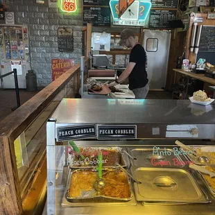 a man preparing food in a restaurant