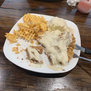 Chicken fried steak , waffle fries,  &amp; mashed potatoes!