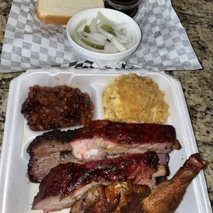 I&apos;ve just been on a BBQ frenzy lately lol. Smoked chicken, pork ribs, brisket with beans and jalapeño truffle Mac.