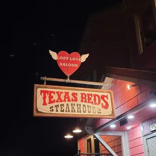 a neon sign for a restaurant