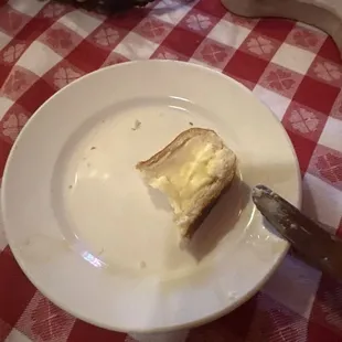 Garbage.  Cold bread and frozen butter.