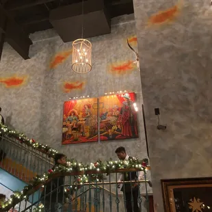 a man and a woman sitting at a table in a restaurant