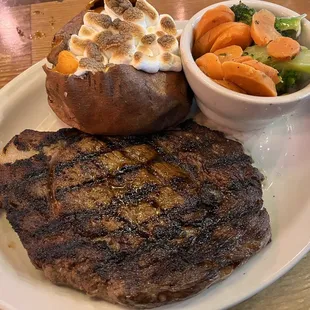 Ft. Worth Ribeye w/ loaded baked potato and mixed veggies