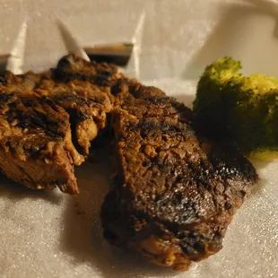 steak and broccoli on a plate