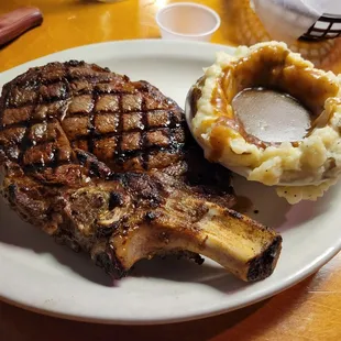 Bone in ribeye, mashed potatoes and brown gravy