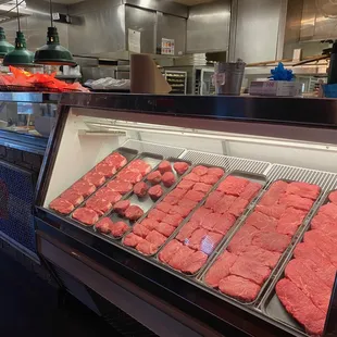 Here is their meat showcase. On top, under the heat lamps are the fresh rolls.