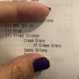 Fried chicken on the receipt, fried mystery meat On the plate.