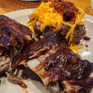 1/2 slab of ribs and a loaded baked potato with a salad for dinner