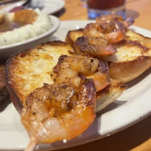 Grilled shrimp on toast. Dry.