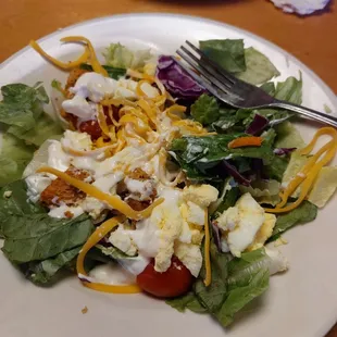 Side salad with blue cheese, love that they put hard boiled egg in the mix