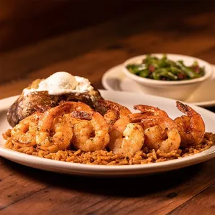 a plate of shrimp and rice