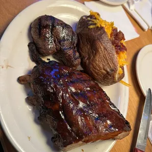 Texas Combo 6oz. filet with Half Rack of ribs and a loaded baked potatoes and buttered corn (not pictured)