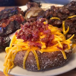 I'm full just looking at the pic with loaded potato and steak!