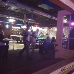 people playing pool