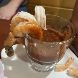 Shrimp cocktail with the actual cocktail sauce inside that we had to pour. It did not come with it