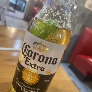 a bottle of corona extra beer