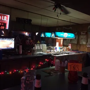 a bar with christmas lights