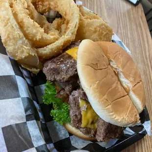 a burger and onion rings