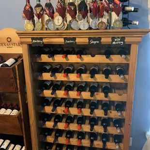 a wine rack full of wine bottles