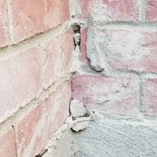 THIS is what the Texas State Roofing representative identified as the cause of the water infiltration (on BOTH sides of the fireplace).