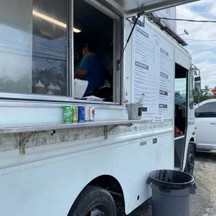a food truck parked in a parking lot