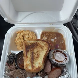 White Oak Smoked Brisket Texas Garlic Sausage Five Mac and Cheese Bourbon Brisket Baked Beans