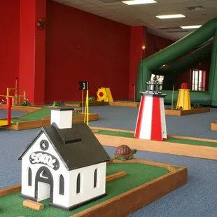 Games shown: Mini Golf Masters and Golf Caddy Distance.