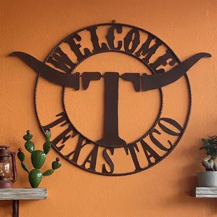 a sign on the wall of a restaurant