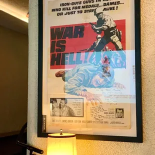 a movie poster and a lamp