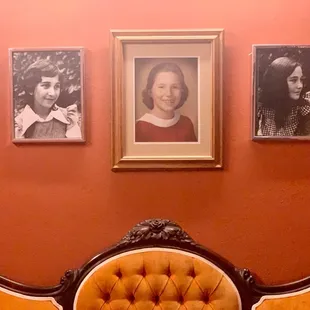 a chair and a portrait of a woman