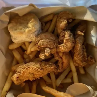 a basket of fried chicken and french fries