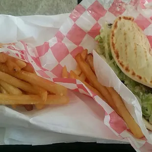 Gyro sandwich combo comes with fries and a drink.
