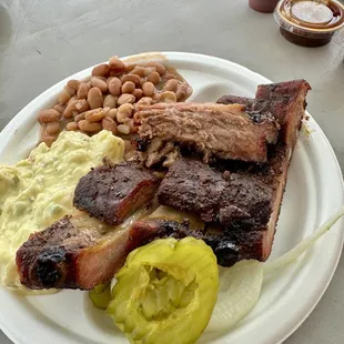 Brisket, pork ribs delicious potato salad and red beans!