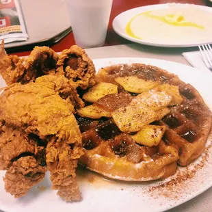 Chicken and waffles with Apple reduction and grits
