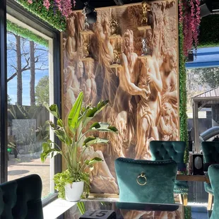 Indoor seating by one of the windows, really cute.