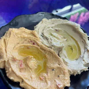 They have regular and spicy hummus. We couldn't decide which to order so we requested a plate that was 50:50 and we all liked them both.