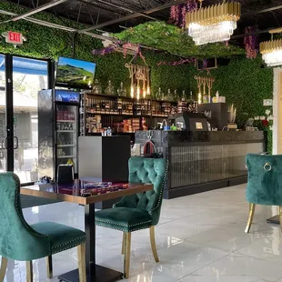 This restaurant is really cute, it's clean, and they get extra points for these fabulous velvet green chairs with brass decorations.