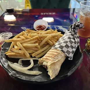 French fry meal with a side of gyro.