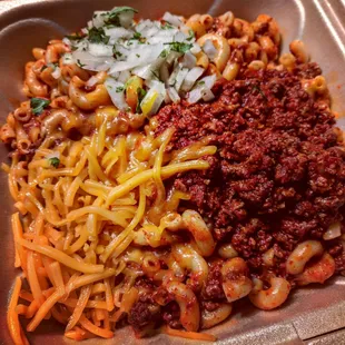 Texas Chili Mac // Elbow macaroni, Texas red chili, chile con queso, and pinto beans