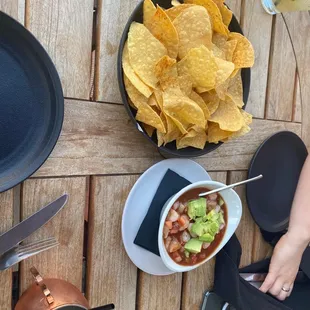 a bowl of chili and tortillas
