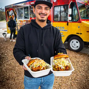 Happy Customer with 2 Big Tex Sandwiches