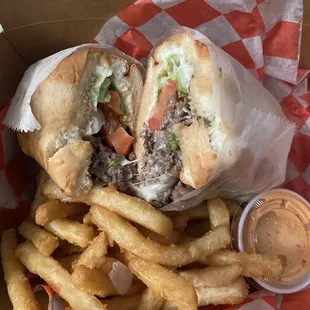 Steak and cheese with fries and chipotle sauce