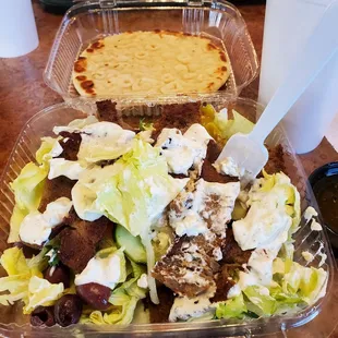 Gyro salad with pita bread excellent salad.