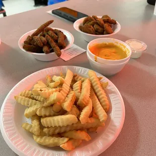 Fries, pickles and green beans. And the cheese for the fries on the side.