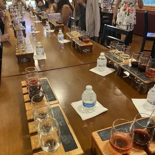 a long table with glasses of wine