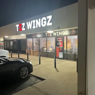 a car parked in front of the store