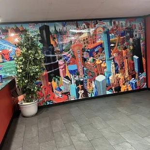 a large mural of a city