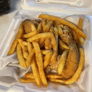 3 piece: fries, piece of bread on the bottom, a small dipping sauce under the waxed paper in the corner are included. $9.99