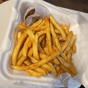 Boneless chicken wings, fries &amp; a piece of bread (on bottom) are included with a small dipping sauce. $9.99